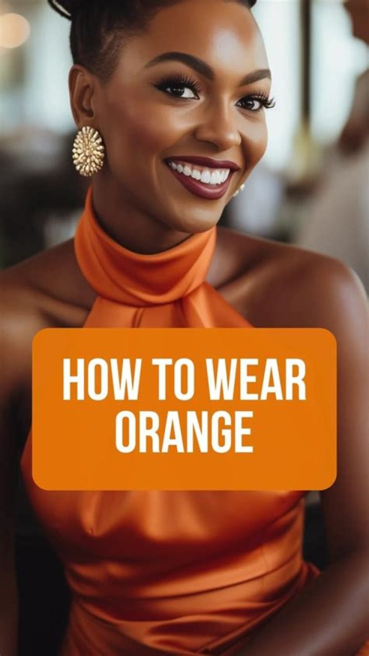 Why did sannyasins wear orange?